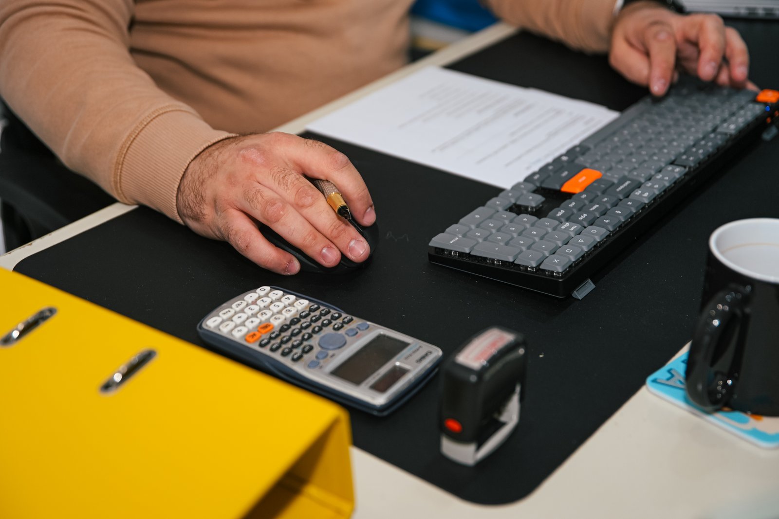 Accounting workspace with calculator and documents